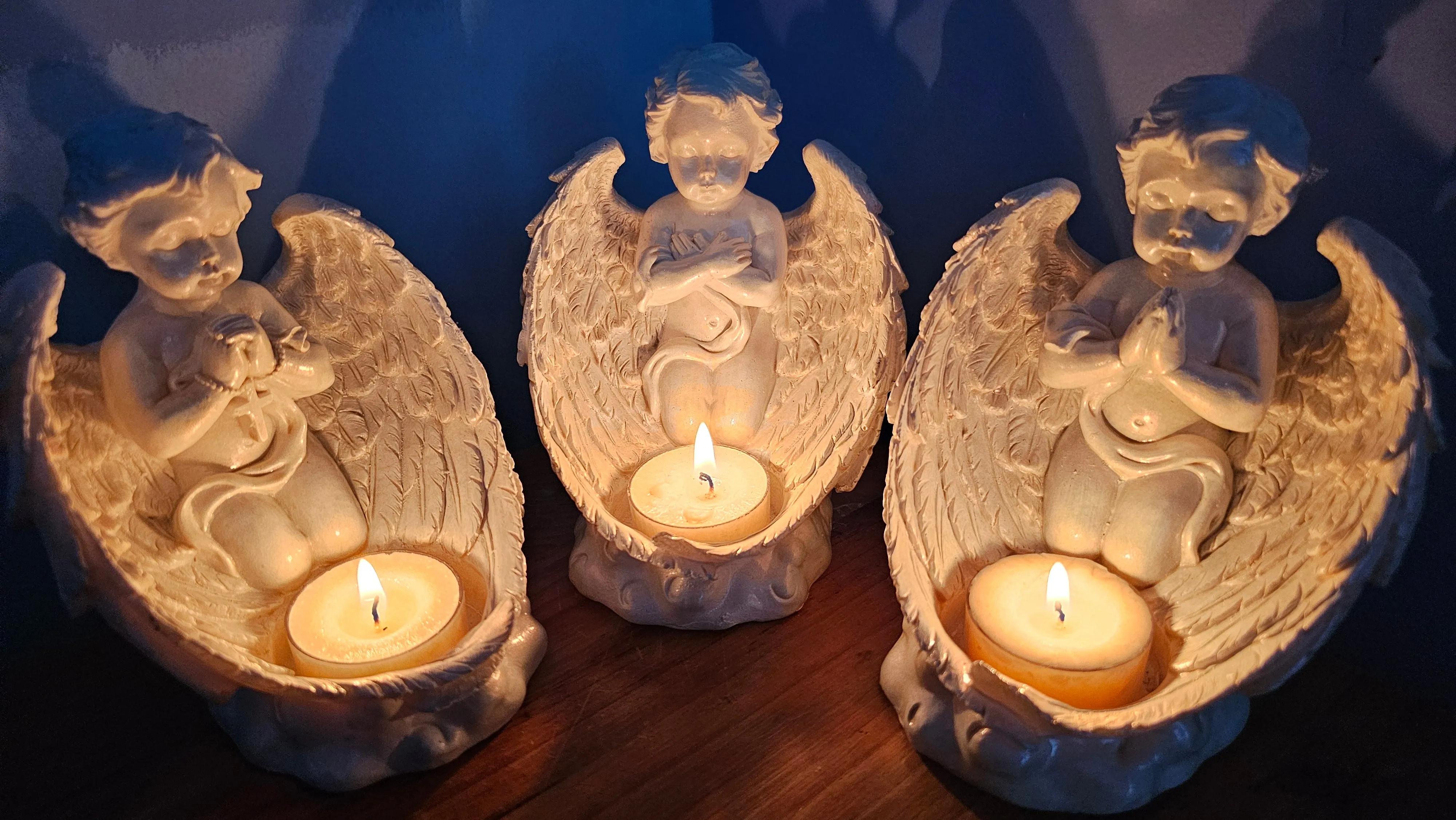 ANGEL CANDLE HOLDERS