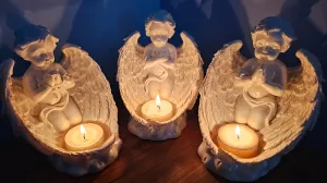 ANGEL CANDLE HOLDERS